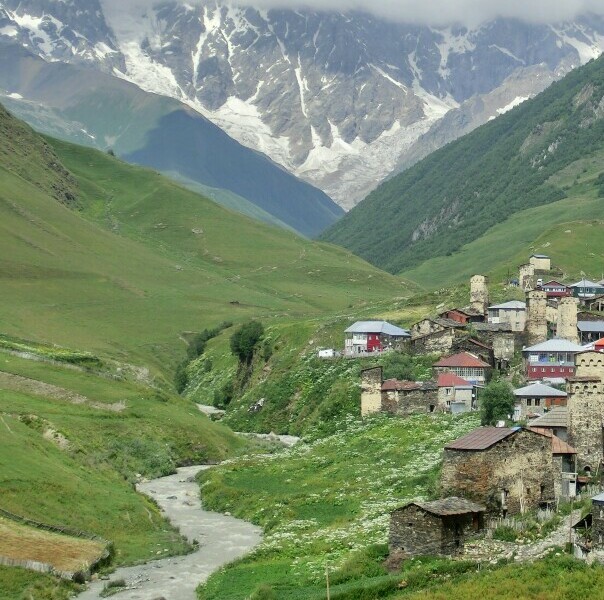 Remote village in a valley surrounded by mountains